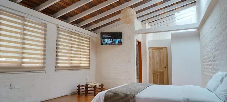 Bed and Breakfast Rustic Quinta La Aurora Baños Habitación foto